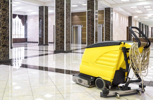 Cleaning,Machine,In,Empty,Office,Lobby,,Yellow,Vacuum,Equipment,Is